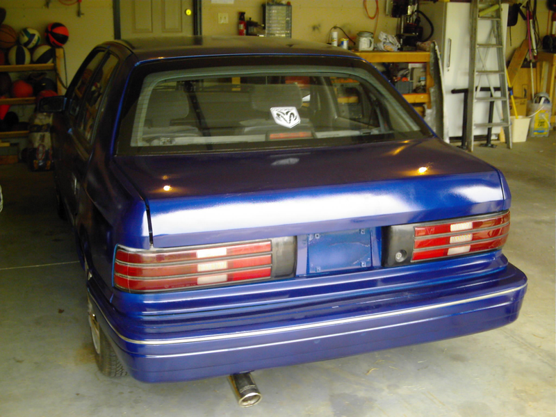 My actual car in 2005, shortly after a novice paint job. Can you spot all of the Wal-Mart +5 HP add-ons?